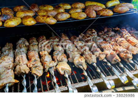 BBQ meat and potato on grill BBQ meat and potato on grill 38026986