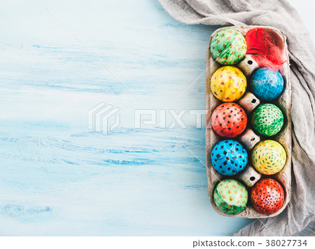 Easter eggs painted with bright colors 38027734