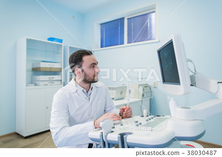 Portrait of a thinking doctor near sceen of 38030487