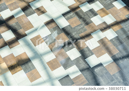 Bright colored tile floor In the sun. 38030711