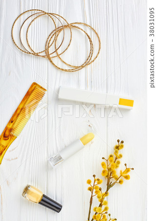 Cosmetics and jewelry, wooden background. Cosmetics and jewelry, wooden background. 38031095