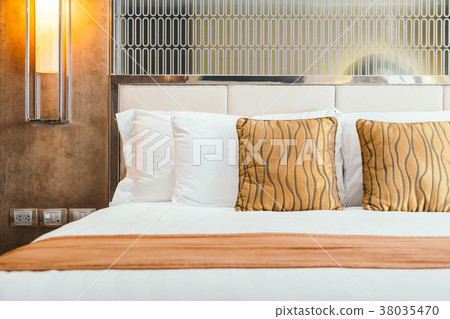 Pillow on bed 38035470