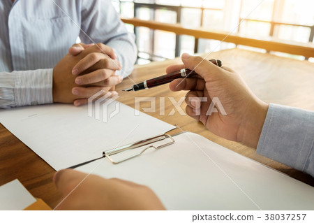 Close-up Of Businessperson Signing Contract,woman writing paper Close-up Of Businessperson Signing Contract,woman writing paper 38037257