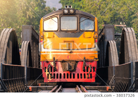 Train over the River Kwai in Kanchanaburi Train over the River Kwai in Kanchanaburi 38037326