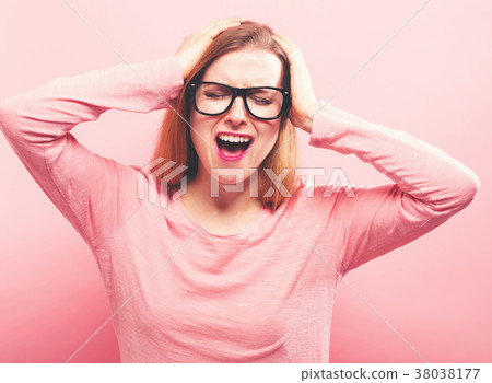 Young woman feeling stressed Young woman feeling stressed 38038177