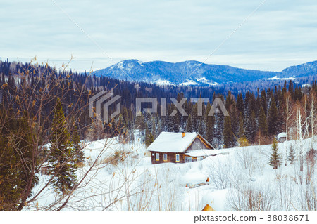 house in winter in the village 38038671