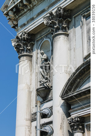 Old statue on facade of the Church Venice, Italy Old statue on facade of the Church Venice, Italy 38039156