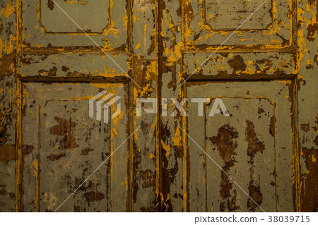 The texture of old door, which the old paint flaki The texture of old door, which the old paint flaki 38039715