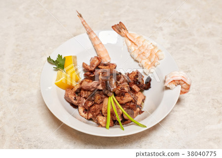 Chicken and shrimps dish on table 38040775