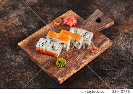 Japanese food sushi maki rolls on wooden board 38040776