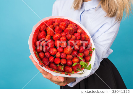 Close up of young woman holding bouquet of Close up of young woman holding bouquet of 38041335