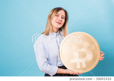 Cryptocurrency and economy concept - Young woman Cryptocurrency and economy concept - Young woman 38041410