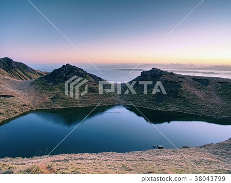 Lake on mountains and of Scottish Highlands 38043799