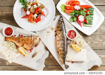 grilled mackerel and sea bass. Salad of fresh grilled mackerel and sea bass. Salad of fresh 38045293