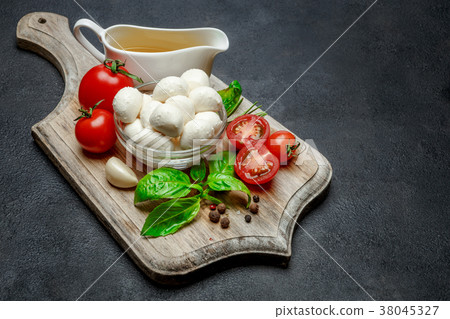 Italian mozzarella cheese and tomatoes. Caprese Italian mozzarella cheese and tomatoes. Caprese 38045327