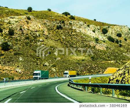 Fast road in the mountains in Spain Fast road in the mountains in Spain 38046169