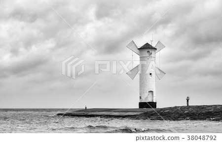 Windmill lighthouse. Windmill lighthouse. 38048792
