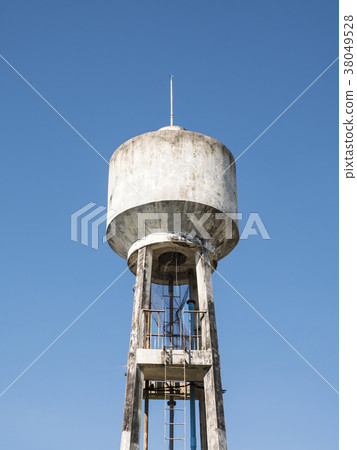 Concrete water tower with the metal ladder. Concrete water tower with the metal ladder. 38049528