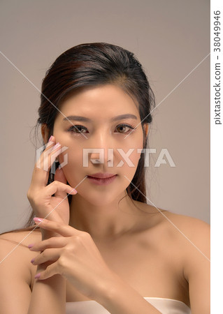 Happy beautiful asian girl with the fresh skin. 38049946