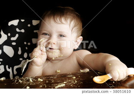 Baby at meal Baby at meal 38051610