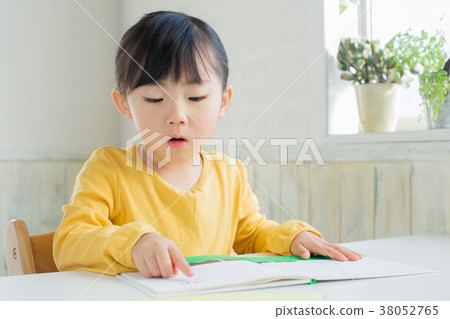 Children reading a picture book Children reading a picture book 38052765