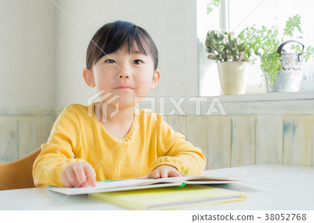 Children reading a picture book Children reading a picture book 38052768