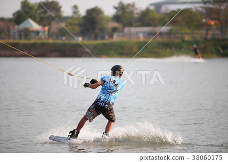 Surfing at the water sports arena. 38060175