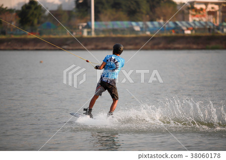 Surfing at the water sports arena. 38060178