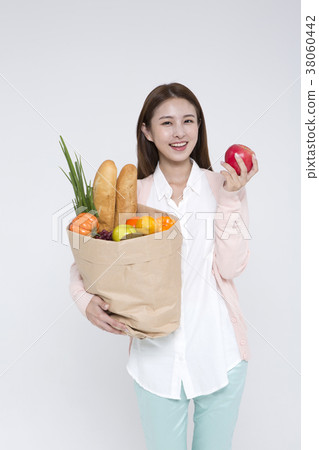 Everyday life of beautiful young woman, shopping, working concept photo in studio shot white background. 001 38060442