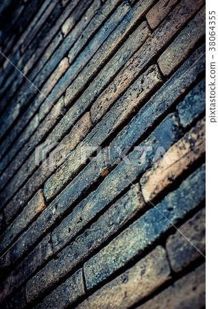 Old brick wall texture in a background Old brick wall texture in a background 38064355