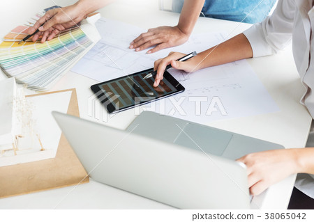 Creative or Interior designers teamwork with pantone swatch and Creative or Interior designers teamwork with pantone swatch and 38065042