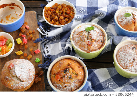 Banana Nut raisin Muffins on towel Banana Nut raisin Muffins on towel 38066244