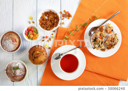 freshly baked Muffins and cup of tea freshly baked Muffins and cup of tea 38066248