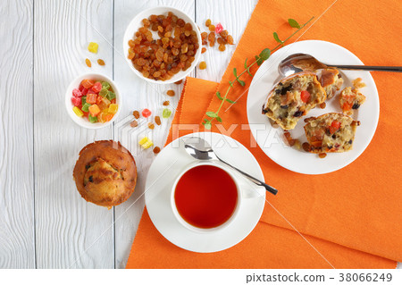 Banana Nut raisin Muffin on table 38066249