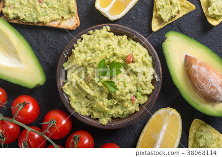 Guacamole with ingredients 38068114
