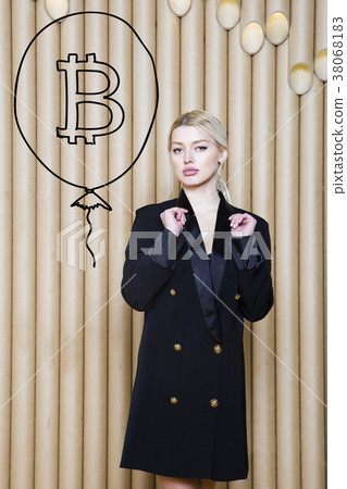 Beautiful blond woman showing standing near 38068183