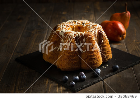 Bundt cake wih topping. 38068469