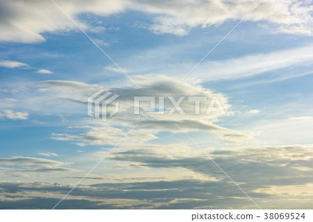 Beautiful cirrus clouds against the blue sky 38069524