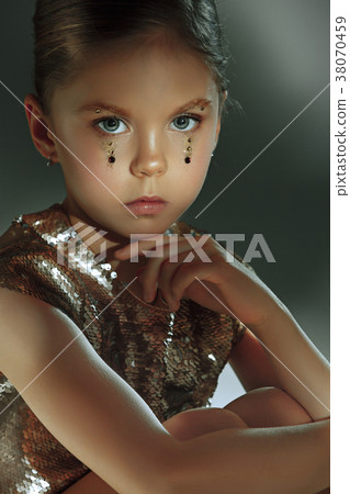 The fashion portrait of young beautiful teen girl The fashion portrait of young beautiful teen girl 38070459