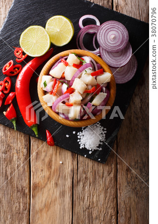 Healthy fish ceviche of cod with onion and pepper Healthy fish ceviche of cod with onion and pepper 38070796