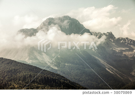 Amazing mountains under dramatic sky Amazing mountains under dramatic sky 38070869