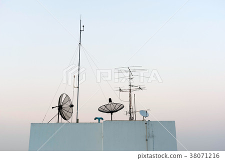 Satellite Dishes and TV antennas on skyscraper in Satellite Dishes and TV antennas on skyscraper in 38071216