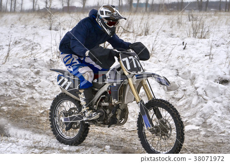 Sportsman racer man fulfills a fast ride Sportsman racer man fulfills a fast ride 38071972
