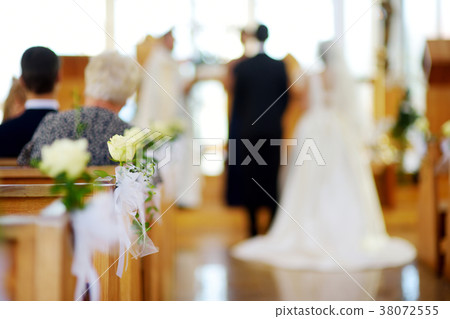 Beautiful flower wedding decoration in a church during wedding ceremony 38072555