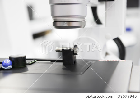 Bolt inspected by microscope 38075949