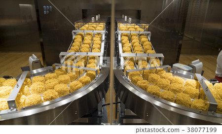 Instant noodles in production process 38077199