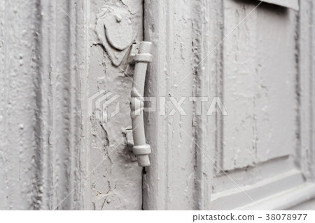 Close-up keyholes with curtains and a handle on Close-up keyholes with curtains and a handle on 38078977