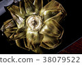 Boiled artichoke on a dark plate 38079522