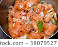 Salmon being prepared for marination 38079527