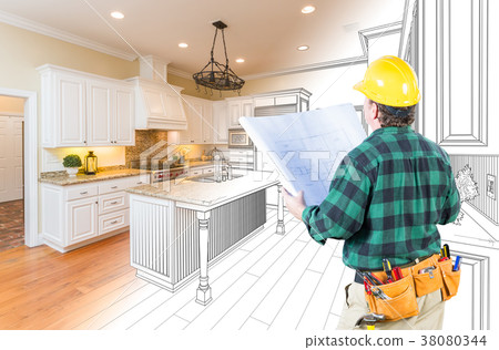 Male Contractor with Hard Hat and Plans Looking At Custom Kitche 38080344